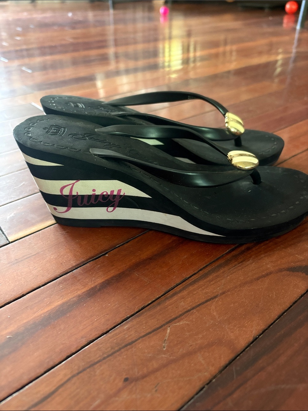 Juicy Couture Black Striped Wedge Flip Flops with Gold Accents